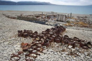 Memorial cross of empty tin cans,<br />used as a post office to leave messages,<br />dates to 1854 and the search for survivors<br />of the ill-fated Sir John Franklin Expedition.<br />It's located on Beechey Island in Nunavut, Canada<br />(© Pat and Rosemarie Keough/Corbis)